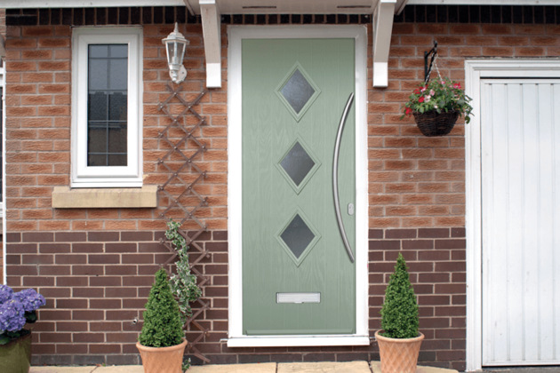 green composite doors with a diamond window