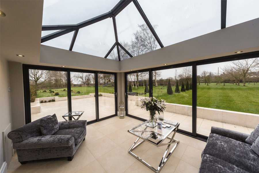 orangery with black aluminum roof and windows