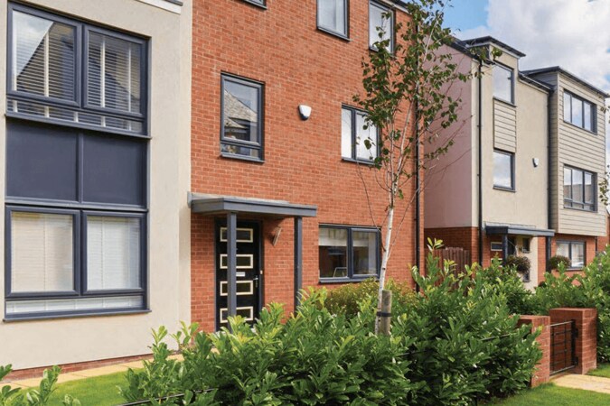 dark navy casement window on apartment building close up