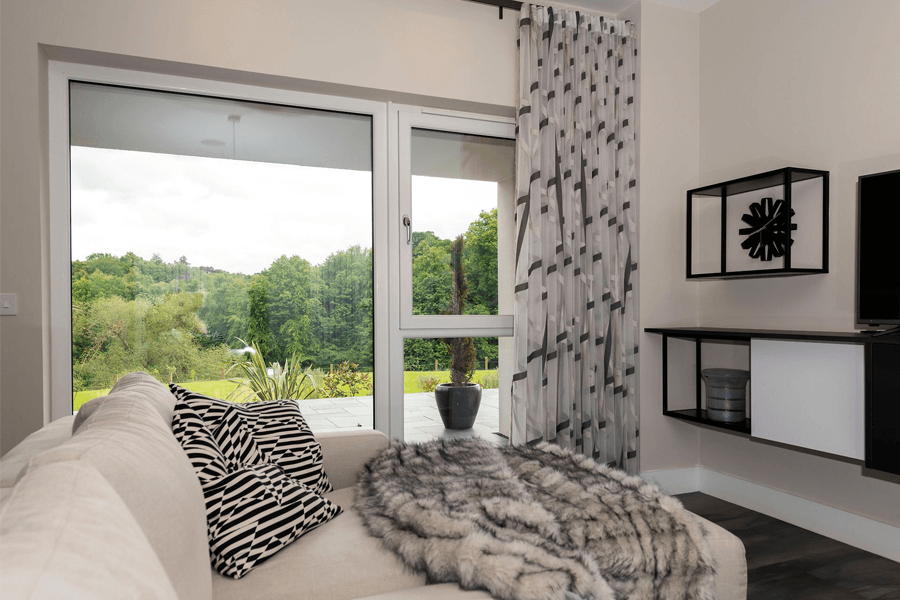 white uPVC tilt turn window bedroom interior